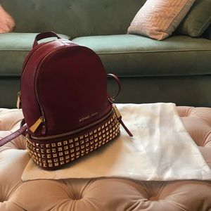 michael kors backpack studded red